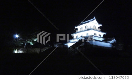 The castle and surrounding area are lit up in blue. The castle and surrounding area are lit up in blue. 138047053