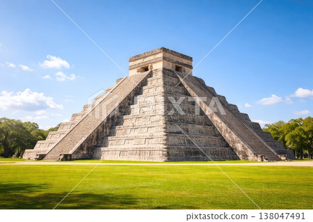 Ancient Mayan pyramid Chichen Itza landmark in Mexico under blue sky 138047491