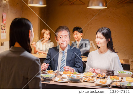 Salarymen having a good time at an izakaya (Japanese pub) Salarymen having a good time at an izakaya (Japanese pub) 138047531