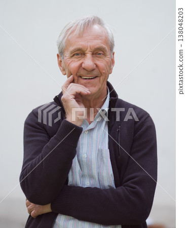 Smiling grandfather portrait representing family, three generations and warm senior connection in casual wear Smiling grandfather portrait representing family, three generations and warm senior connection in casual wear 138048203