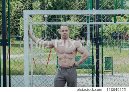 A CrossFit man poses for the camera on a sports 138049255