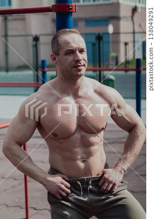 A CrossFit man poses for the camera on a sports 138049291