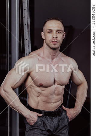 Bodybuilder posing in the gym, aesthetic body Bodybuilder posing in the gym, aesthetic body 138049298