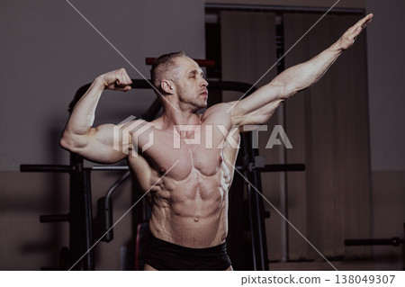 Bodybuilder posing in the gym, aesthetic body Bodybuilder posing in the gym, aesthetic body 138049307