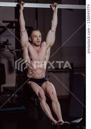 Bodybuilder training in the gym, aesthetic body Bodybuilder training in the gym, aesthetic body 138049374