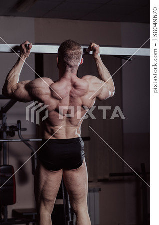 Bodybuilder training in the gym, aesthetic body Bodybuilder training in the gym, aesthetic body 138049670