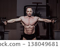 Bodybuilder training in the gym, aesthetic body 138049681