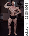 Bodybuilder posing in the gym, aesthetic body 138049684
