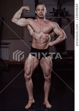 Bodybuilder posing in the gym, aesthetic body Bodybuilder posing in the gym, aesthetic body 138049684