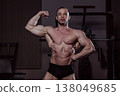 Bodybuilder posing in the gym, aesthetic body 138049685