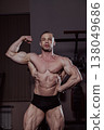 Bodybuilder posing in the gym, aesthetic body 138049686
