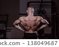 Bodybuilder posing in the gym, aesthetic body 138049687