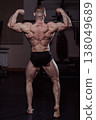 Bodybuilder posing in the gym, aesthetic body 138049689