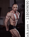 Bodybuilder posing in the gym, aesthetic body 138049690