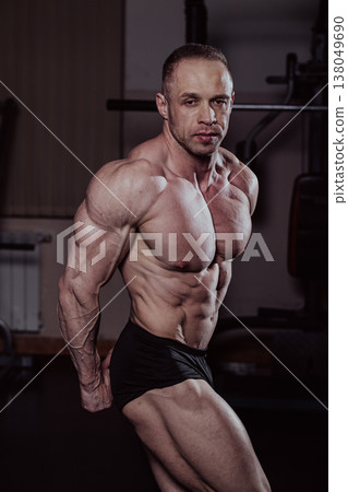 Bodybuilder posing in the gym, aesthetic body Bodybuilder posing in the gym, aesthetic body 138049690