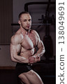 Bodybuilder posing in the gym, aesthetic body 138049691