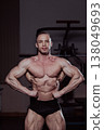 Bodybuilder posing in the gym, aesthetic body 138049693