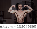Bodybuilder posing in the gym, aesthetic body 138049695