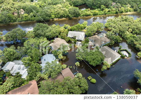 Tropical rainstorm flooded residential homes in suburban community in Florida. Hurricane aftermath 138050037