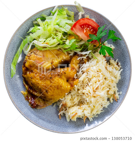 Tender meat of roasted chicken is garnished with boiled rice, vegetable salad. Tender meat of roasted chicken is garnished with boiled rice, vegetable salad. 138053710