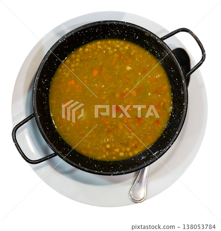 Hearty lentil soup with vegetables 138053784