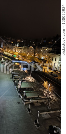 Night view of the embankment and historic buildings by the river, Karlovy Vary, Czech Republic Night view of the embankment and historic buildings by the river, Karlovy Vary, Czech Republic 138053924