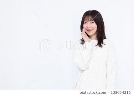 A woman calling out with a smile A woman calling out with a smile 138054215