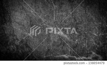 Dark textured marble background with intricate veining patterns, suitable for design projects, wallpapers, and various artistic applications 138054479