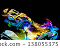 Rainbow-colored soap bubbles floating against a black background 138055375