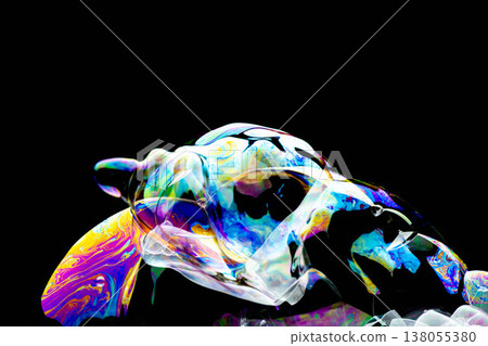 The image of rainbow-colored soap bubbles and foam. 138055380