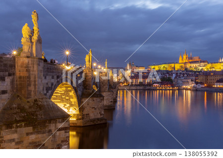 Charles Bridge and Prague Castle over Vltava River at dawn in Prague, Czech Republic 138055392