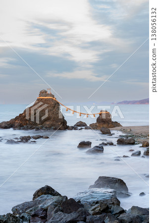 A landscape of the sea at sunset and a torii gate. 138056132