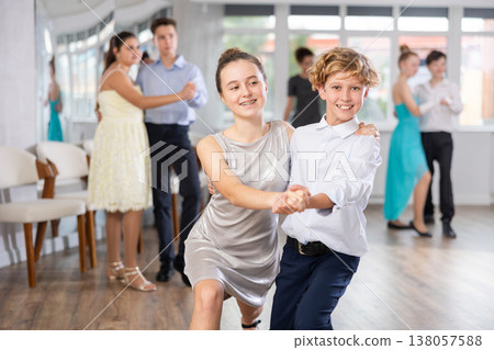 Viennese Waltz performed by teenage girls and boys in dance studio Viennese Waltz performed by teenage girls and boys in dance studio 138057588
