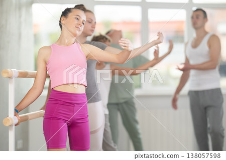 Girls and boys of choreographic lesson learn from experienced master of theatrical studio 138057598