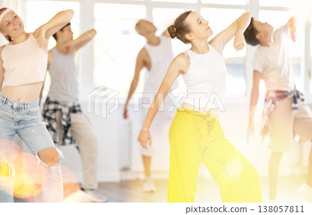 Teenage girl dancing jazz funk in group Teenage girl dancing jazz funk in group 138057811