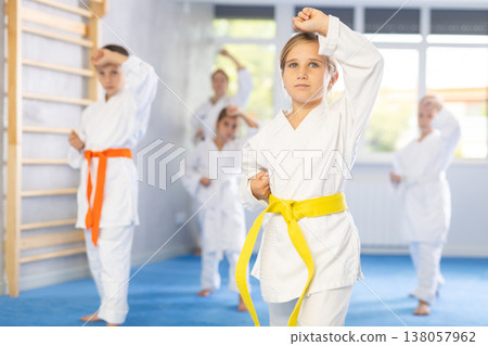 Kids are dedicated to their martial arts Kids are dedicated to their martial arts 138057962