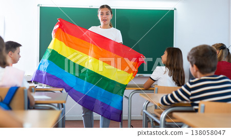 Young female teacher talking with tweens about LGBT community Young female teacher talking with tweens about LGBT community 138058047