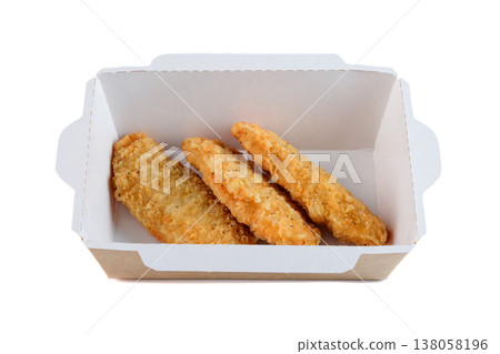 Freshly baked crispy chicken strip in craft paper takeout container on white background side view close up delicious savory american junk food snack Freshly baked crispy chicken strip in craft paper takeout container on white background side view close up delicious savory american junk food snack 138058196
