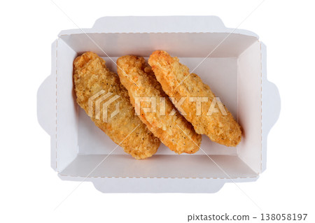 Freshly baked crispy chicken strip in white paper take out container on white background top view close up flat lay with copy space delicious snack Freshly baked crispy chicken strip in white paper take out container on white background top view close up flat lay with copy space delicious snack 138058197