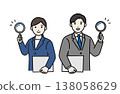 A business person holding a magnifying glass 138058629