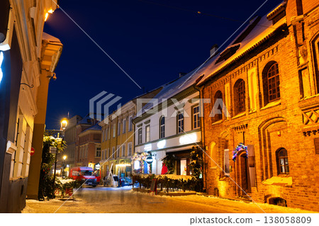 Night view of illuminated Pilies street in Old Town of Vilnius, Lithuania Night view of illuminated Pilies street in Old Town of Vilnius, Lithuania 138058809