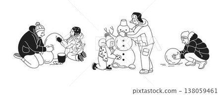 Family Building Snowmen in Wintertime Fun 138059461