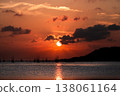 Golden Sunset over Songkhla Lake: Fish Cages and Mountain Silhouettes at Suan Pa Prem 138061164