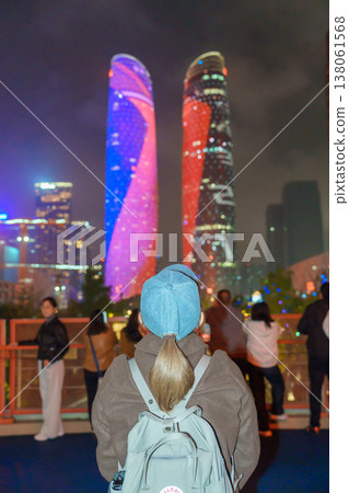 Happy woman traveler travel in Chengdu city. Famous Landmark for tourism attraction in Sichuan, China Happy woman traveler travel in Chengdu city. Famous Landmark for tourism attraction in Sichuan, China 138061568