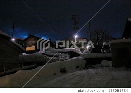 A nighttime view of the snow-covered hot spring town of Zao. A nighttime view of the snow-covered hot spring town of Zao. 138061884