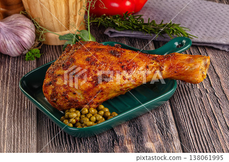 Baked turkey drumstick served green peas Baked turkey drumstick served green peas 138061995