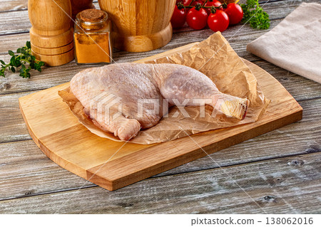 Raw fresh chicken leg with skin 138062016