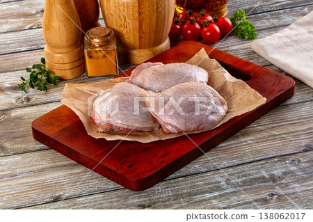 Raw chicken thighs for cooking 138062017
