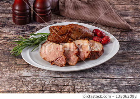 Baked pork sirloin with cornus Baked pork sirloin with cornus 138062098