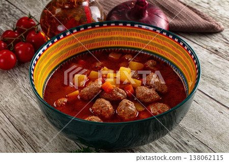 Tomato soup with meatballs and vegetables Tomato soup with meatballs and vegetables 138062115
